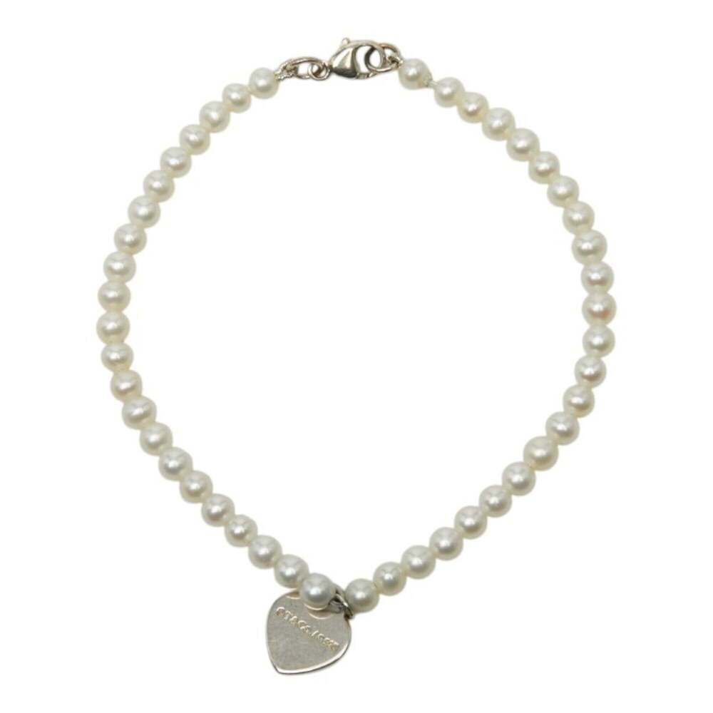 TIFFANY Silver Pearl Heart Charm Bracelet